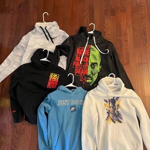 4 boys/mens hoodies. All fit A small Small stain on sleeve of white Kobe hoodie